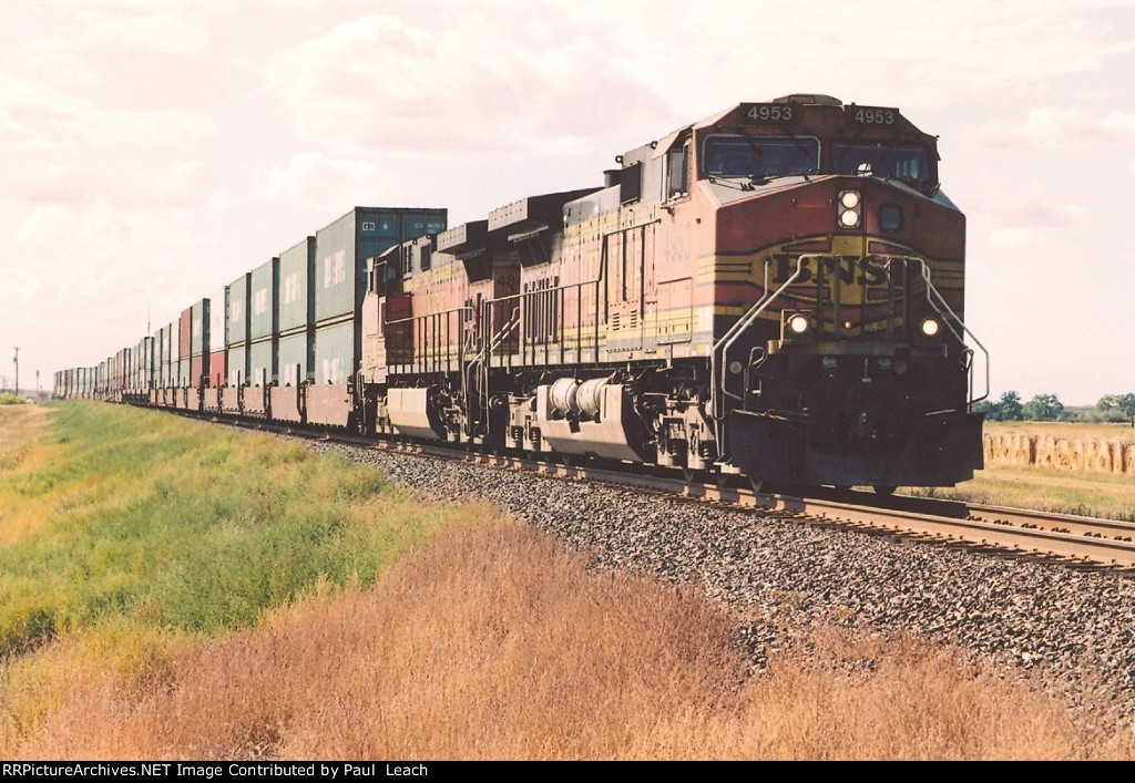 Eastbound stack train comes out of the siding after meeting the two "Builders"